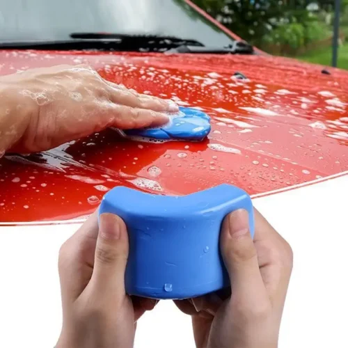 clay bar being used to clean a car